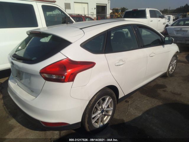 Photo 3 VIN: 1FADP3K20GL344696 - FORD FOCUS 