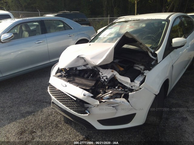 Photo 5 VIN: 1FADP3K20HL317323 - FORD FOCUS 