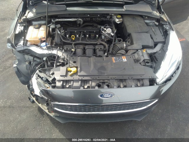 Photo 9 VIN: 1FADP3K20JL272647 - FORD FOCUS 