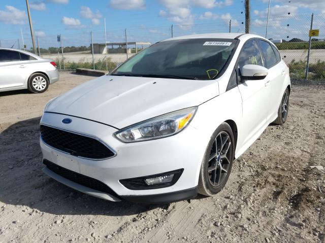 Photo 1 VIN: 1FADP3K21FL375180 - FORD FOCUS SE 