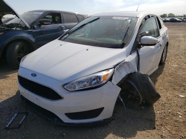 Photo 1 VIN: 1FADP3K21FL382842 - FORD FOCUS SE 