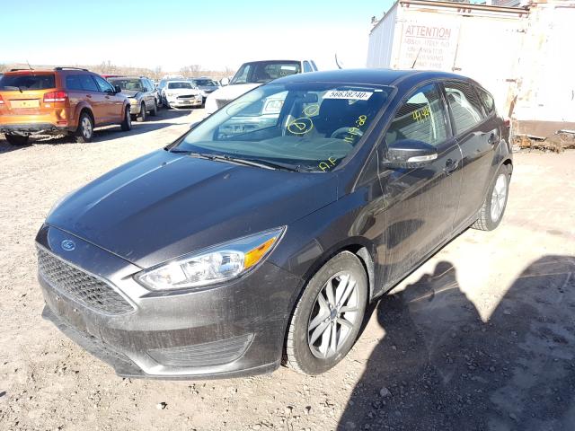 Photo 1 VIN: 1FADP3K21GL212594 - FORD FOCUS SE 