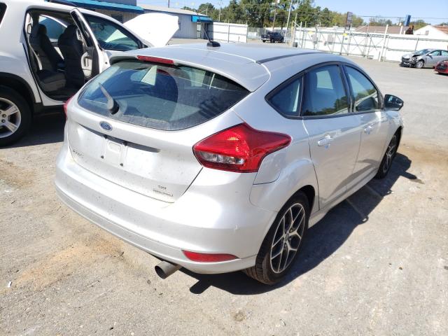 Photo 3 VIN: 1FADP3K21GL244896 - FORD FOCUS SE 