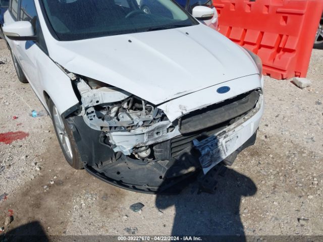 Photo 5 VIN: 1FADP3K21GL253078 - FORD FOCUS 