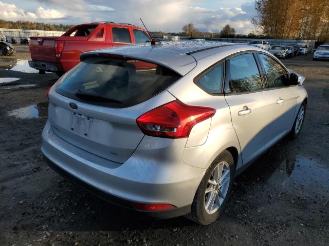 Photo 3 VIN: 1FADP3K21GL255008 - FORD FOCUS SE 