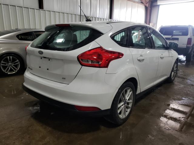 Photo 3 VIN: 1FADP3K21GL285531 - FORD FOCUS SE 