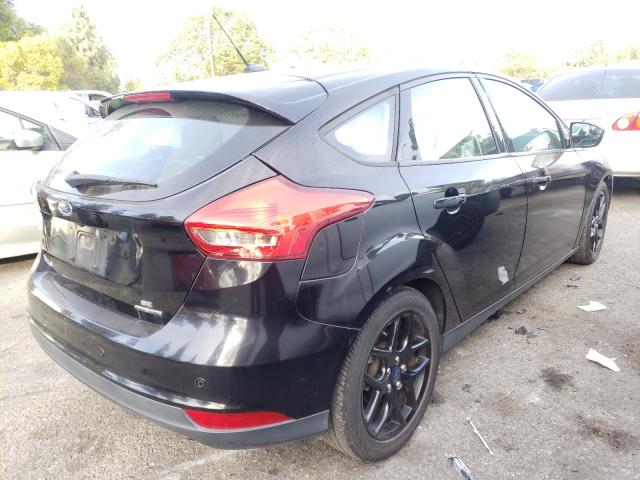 Photo 3 VIN: 1FADP3K21GL299512 - FORD FOCUS SE 