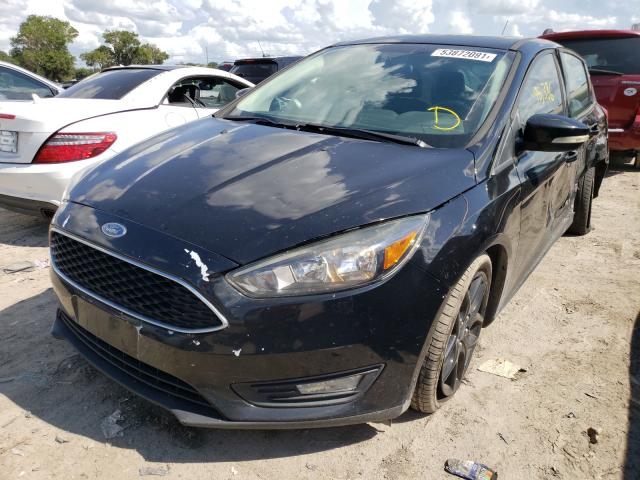 Photo 1 VIN: 1FADP3K21GL302103 - FORD FOCUS SE 