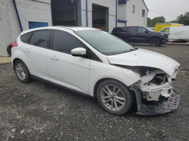 Photo 3 VIN: 1FADP3K21GL304028 - FORD FOCUS SE 