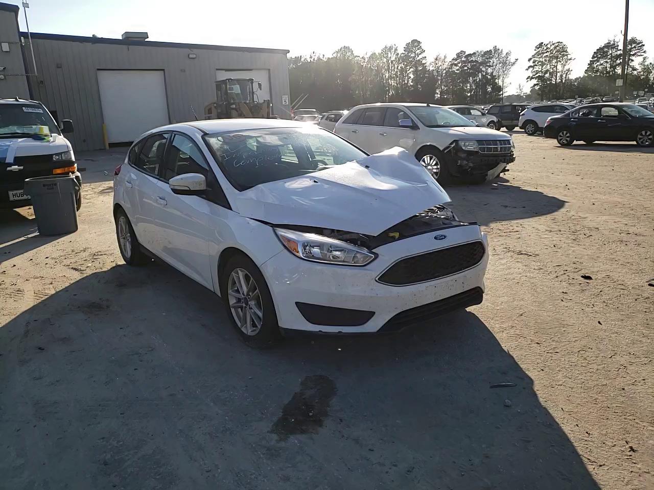 Photo 10 VIN: 1FADP3K21GL339071 - FORD FOCUS 