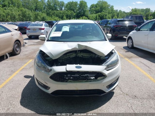 Photo 5 VIN: 1FADP3K21GL340530 - FORD FOCUS 