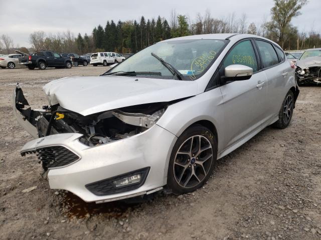 Photo 1 VIN: 1FADP3K21GL403402 - FORD FOCUS SE 