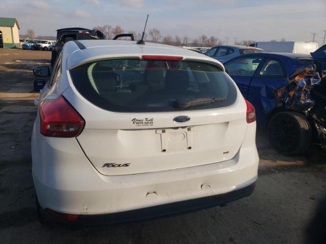 Photo 5 VIN: 1FADP3K21JL251693 - FORD FOCUS SE 