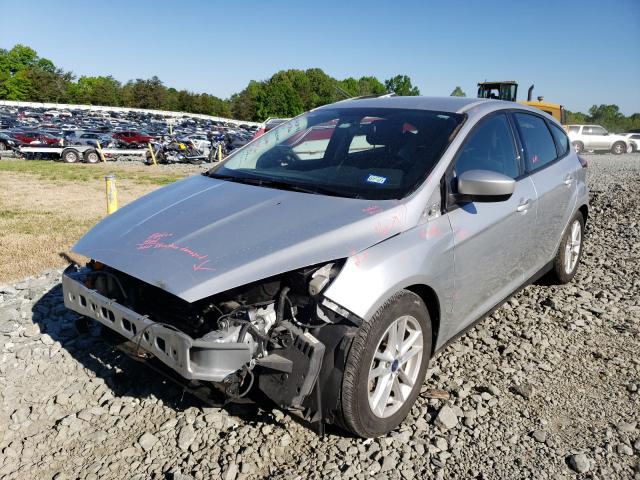 Photo 1 VIN: 1FADP3K21JL302724 - FORD FOCUS SE 