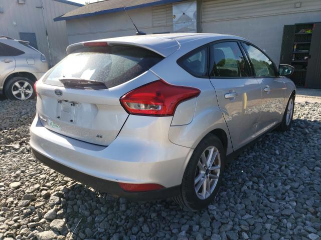 Photo 3 VIN: 1FADP3K21JL302724 - FORD FOCUS SE 