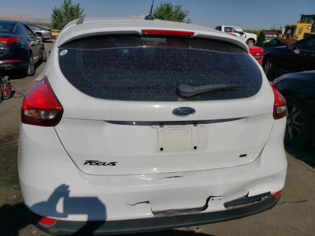 Photo 5 VIN: 1FADP3K21JL304103 - FORD FOCUS SE 