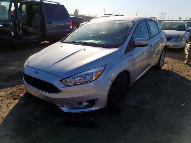 Photo 1 VIN: 1FADP3K21JL315568 - FORD FOCUS SE 