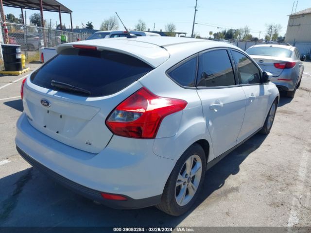 Photo 3 VIN: 1FADP3K22EL132475 - FORD FOCUS 