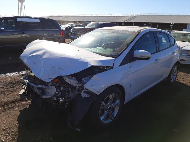 Photo 1 VIN: 1FADP3K22EL294736 - FORD FOCUS SE 