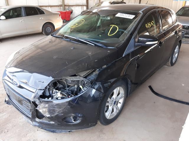 Photo 1 VIN: 1FADP3K22EL325600 - FORD FOCUS SE 