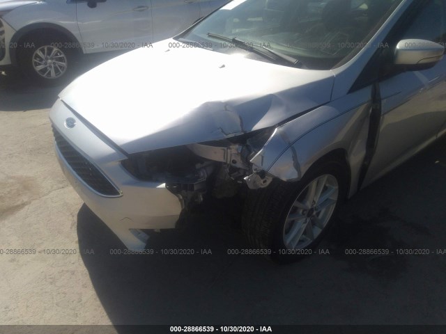 Photo 5 VIN: 1FADP3K22GL216928 - FORD FOCUS 