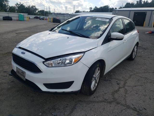 Photo 1 VIN: 1FADP3K22GL290009 - FORD FOCUS SE 