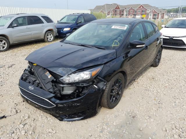 Photo 1 VIN: 1FADP3K22GL292889 - FORD FOCUS SE 