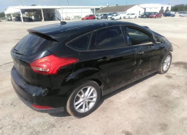 Photo 3 VIN: 1FADP3K22GL304720 - FORD FOCUS 