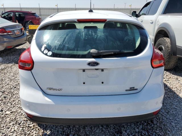 Photo 5 VIN: 1FADP3K22GL311439 - FORD FOCUS SE 