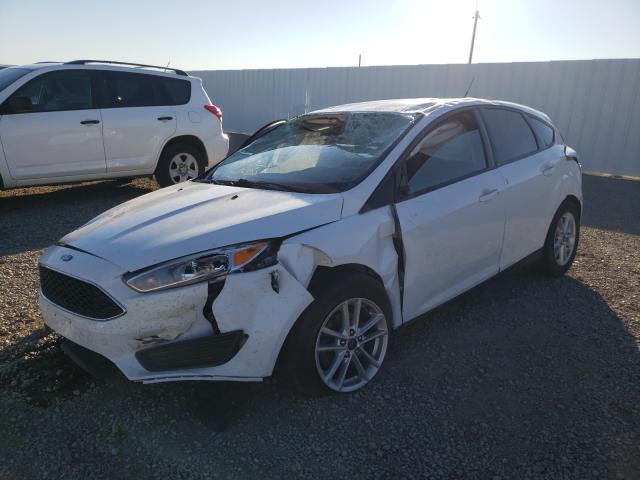 Photo 1 VIN: 1FADP3K22GL338334 - FORD FOCUS SE 