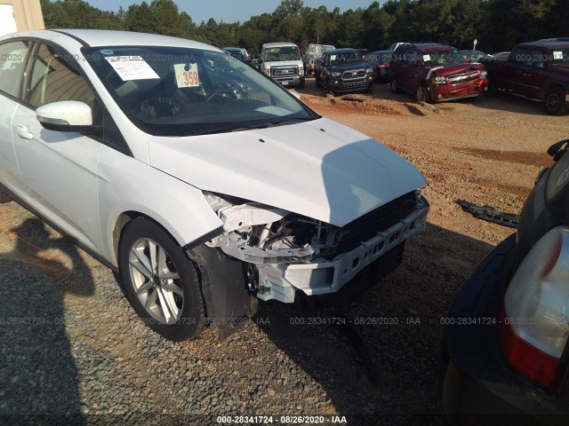 Photo 5 VIN: 1FADP3K22GL377182 - FORD FOCUS 