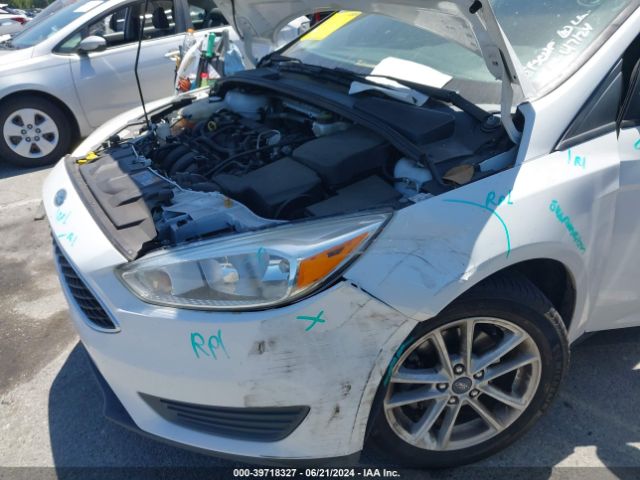 Photo 5 VIN: 1FADP3K22HL216624 - FORD FOCUS 