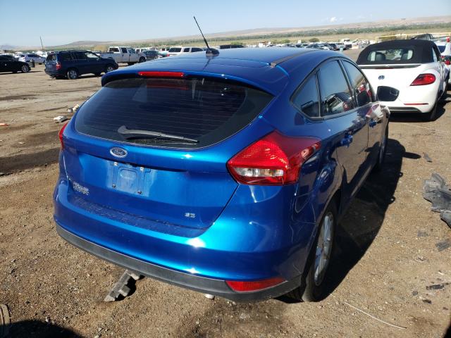 Photo 3 VIN: 1FADP3K22JL211431 - FORD FOCUS SE 