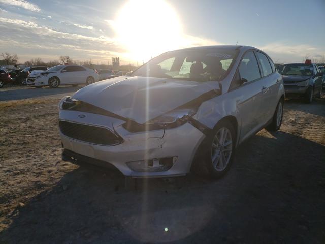 Photo 1 VIN: 1FADP3K22JL259950 - FORD FOCUS SE 