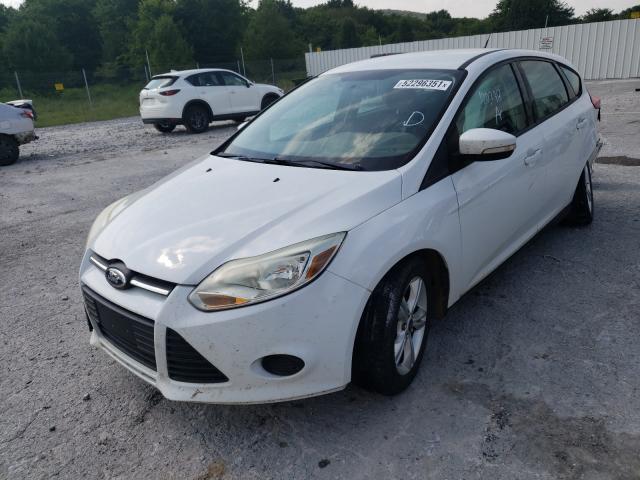 Photo 1 VIN: 1FADP3K23DL297451 - FORD FOCUS SE 