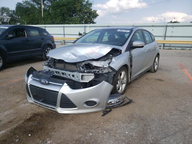 Photo 1 VIN: 1FADP3K23EL118102 - FORD FOCUS SE 