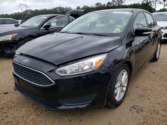 Photo 1 VIN: 1FADP3K23GL204674 - FORD FOCUS SE 