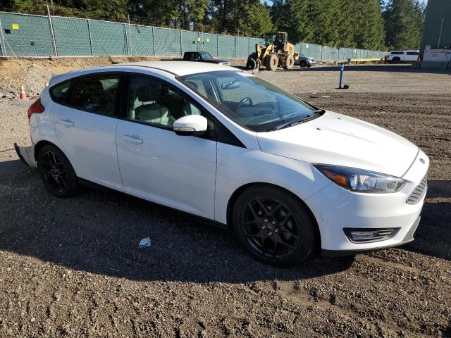 Photo 3 VIN: 1FADP3K23GL213214 - FORD FOCUS SE 