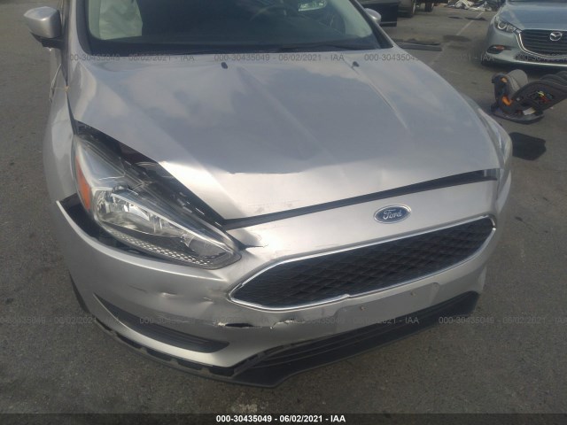 Photo 5 VIN: 1FADP3K23GL290410 - FORD FOCUS 