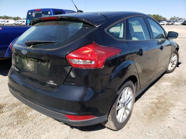 Photo 3 VIN: 1FADP3K23GL294554 - FORD FOCUS SE 