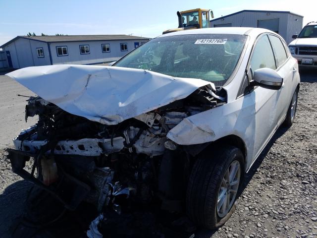 Photo 1 VIN: 1FADP3K23GL297695 - FORD FOCUS SE 