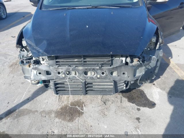 Photo 5 VIN: 1FADP3K23GL370077 - FORD FOCUS 