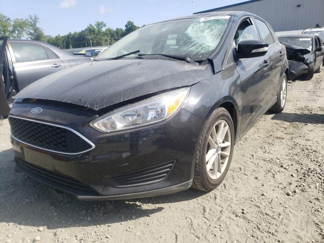 Photo 1 VIN: 1FADP3K23HL312584 - FORD FOCUS SE 