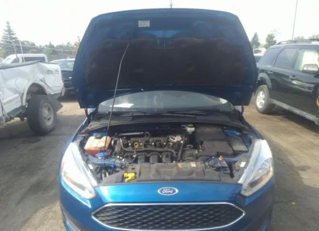 Photo 9 VIN: 1FADP3K23JL258712 - FORD FOCUS 