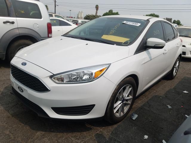 Photo 1 VIN: 1FADP3K23JL331206 - FORD FOCUS SE 