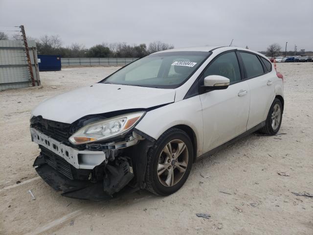 Photo 1 VIN: 1FADP3K24DL117040 - FORD FOCUS SE 