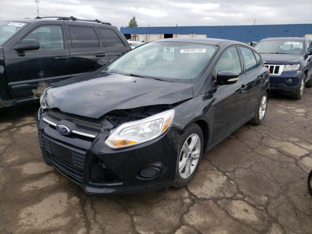 Photo 1 VIN: 1FADP3K24DL318629 - FORD FOCUS SE 