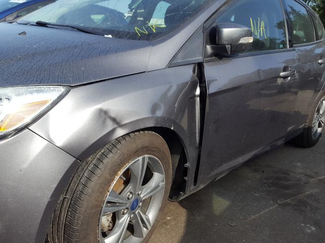 Photo 8 VIN: 1FADP3K24EL297928 - FORD FOCUS SE 