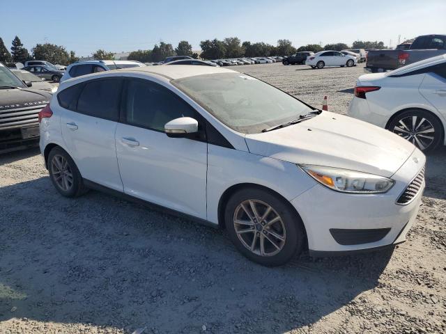 Photo 3 VIN: 1FADP3K24FL335675 - FORD FOCUS SE 