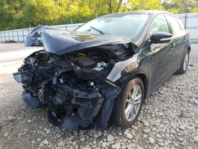 Photo 1 VIN: 1FADP3K24GL211777 - FORD FOCUS SE 